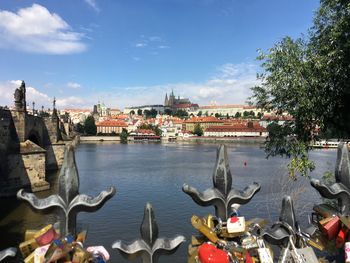 View of river and buildings in city