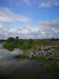 Scenic view of lake against sky