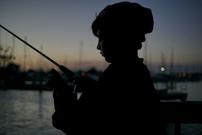 Woman looking at sunset