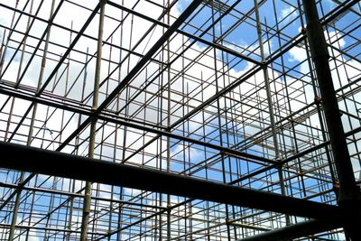 Low angle view of scaffolding against sky