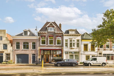 Buildings in city against sky