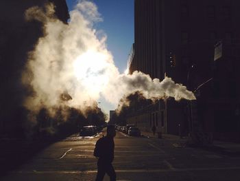 City street against cloudy sky