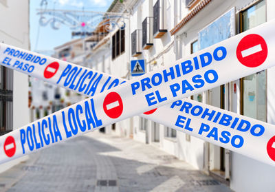 Close-up of road sign on street