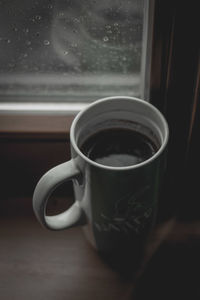 Close-up of coffee cup on table