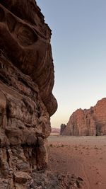 Rock formations in desert against clear sky