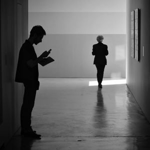 Full length of woman standing on floor