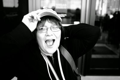 Close-up portrait of cheerful senior woman