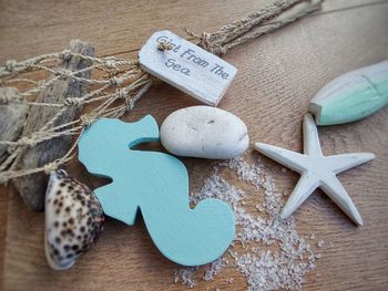 High angle view of various objects on wooden table