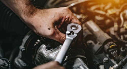 High angle view of man working in machine