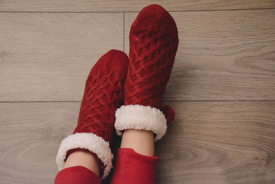 Low section of person wearing red socks during christmas