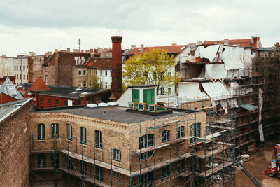 Houses against sky in city