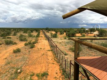 Scenic view of agricultural landscape against sky