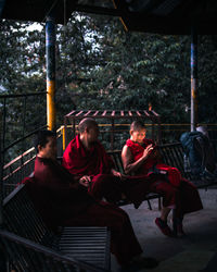 Group of people sitting outdoors