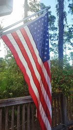 Low angle view of flag against sky