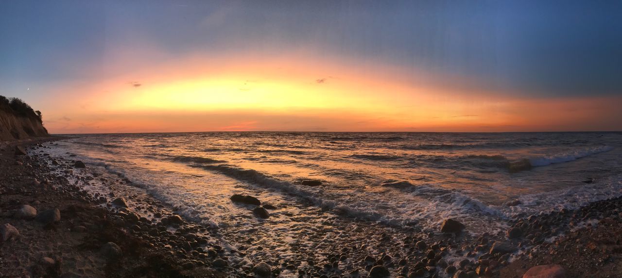sea, sunset, beauty in nature, nature, water, horizon over water, scenics, wave, beach, tranquil scene, sky, outdoors, tranquility, idyllic, sun, no people, sand, tide, motion, day