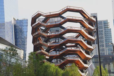 Low angle view of modern buildings against clear sky