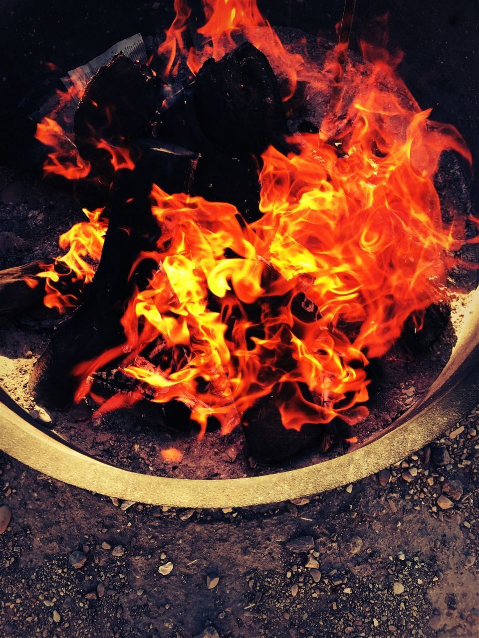 CLOSE-UP HIGH ANGLE VIEW OF BONFIRE