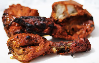 Close-up of meat on barbecue grill