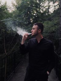 Man smoking outdoors