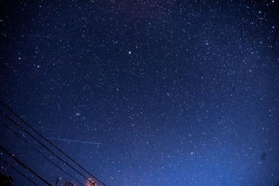 Low angle view of stars against sky at night