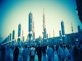 People looking at city skyline