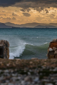 Scenic view of sea against sky during sunset