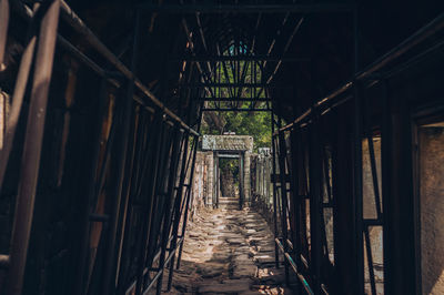 Empty alley amidst buildings