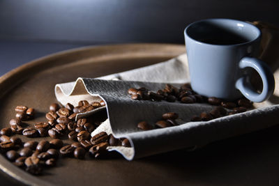 Close-up of coffee cup on table