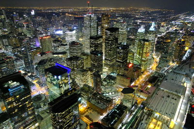 High angle view of illuminated city buildings at night
