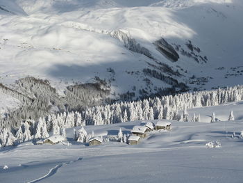 Scenic view of snow covered mountains