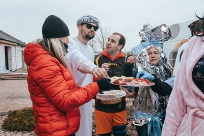 Group of people standing in winter