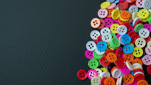 High angle view of multi colored buttons