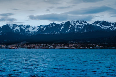 Scenic view of snowcapped mountains against sky during winter