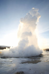 View of hot spring against sky