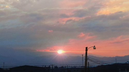 Scenic view of dramatic sky during sunset