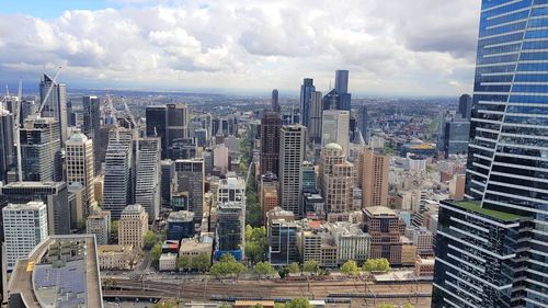 Modern buildings in city against sky