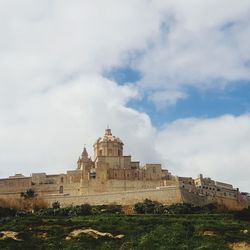 Low angle view of historic building against sky