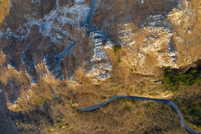 High angle view of road amidst rocks