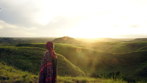 Woman looking at mountains