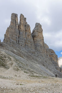 Low angle view of rock formations against sky