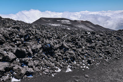 Panoramic view of volcanic landscape against sky