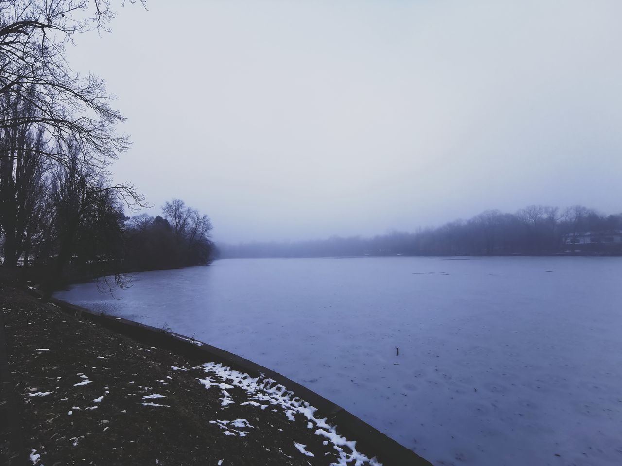 SCENIC VIEW OF LAKE DURING WINTER