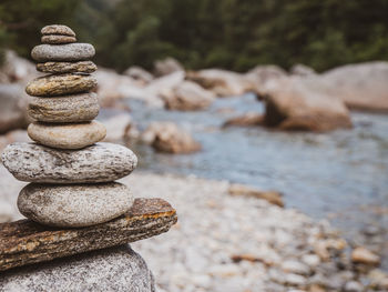 Close-up of stone stack on rock