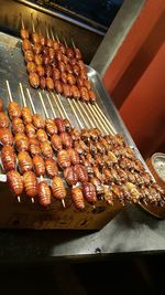 High angle view of meat on barbecue