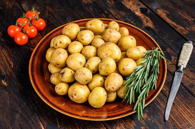 High angle view of fruits in container on table