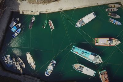 High angel view of boats moored in lake