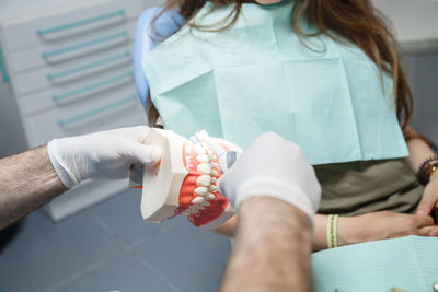 Midsection of woman washing hands