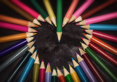 High angle view of colored pencils on table