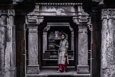 Portrait of man standing in temple