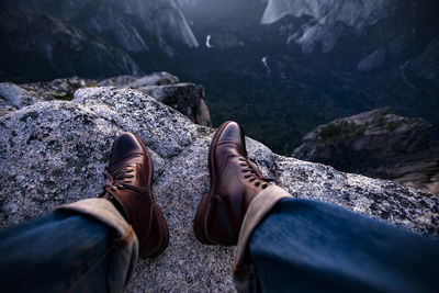 Low section of man on rock